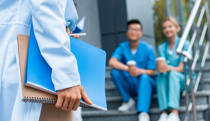 Doctor holding a folder